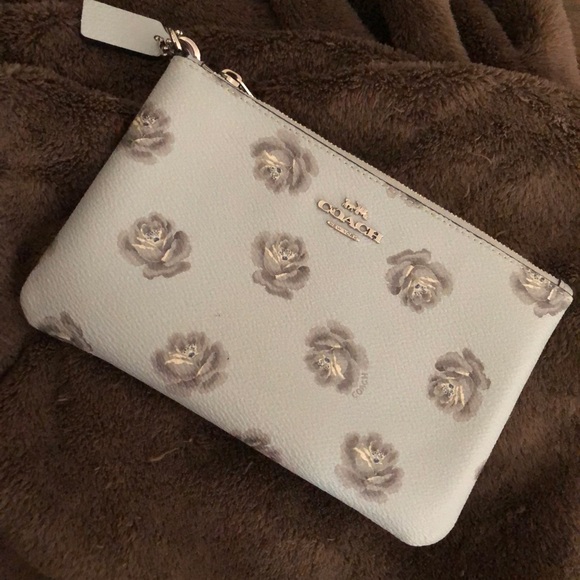 Coach Handbags - NWOT Coach gorgeous rose pattern wristlet!!